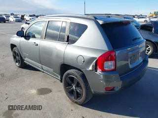 2011 Jeep Compass with VIN 1J4NT1FA0BD246586, listed as a IAAI auction lot 41253630 with 120,540 mi miles. Bid and sale history available at carsss.com. Image 3.