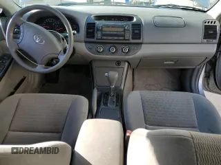 2005 Toyota Camry LE with VIN 4T1BF30K35U104620, listed as a Copart auction lot 53390975 with 146,958 mi miles and Salvage Title. Bid and sale history available at DreamBid. Image 8.