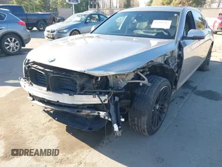2015 BMW 7 Series 750Li with VIN WBAYE8C55FD782384, listed as a IAAI auction lot 41319363 with 75,784 mi miles. Bid and sale history available at carsss.com. Image 6.