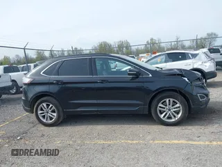 2015 Ford Edge SEL with VIN 2FMTK4J88FBB05259, listed as a IAAI auction lot 42043247 with 128,987 mi miles. Bid and sale history available at carsss.com. Image 13.