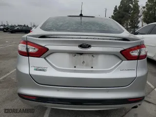 2016 Ford Fusion Energi Titanium with VIN 3FA6P0SUXGR320562, listed as a Copart auction lot 52647485 with 73,931 mi miles and Salvage Title. Bid and sale history available at carsss.com. Image 6.