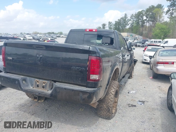 2015 Ram 2500 Laramie with VIN 3C6UR5FL6FG661985, listed as a IAAI auction lot 41941833 with 194,009 mi miles and . Bid and sale history available at DreamBid. Image 4.