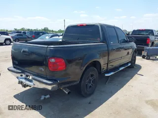 2002 Ford F-150 XLT with VIN 1FTRW07602KD37873, listed as a IAAI auction lot 42048067 with 1 mi miles. Bid and sale history available at carsss.com. Image 4.