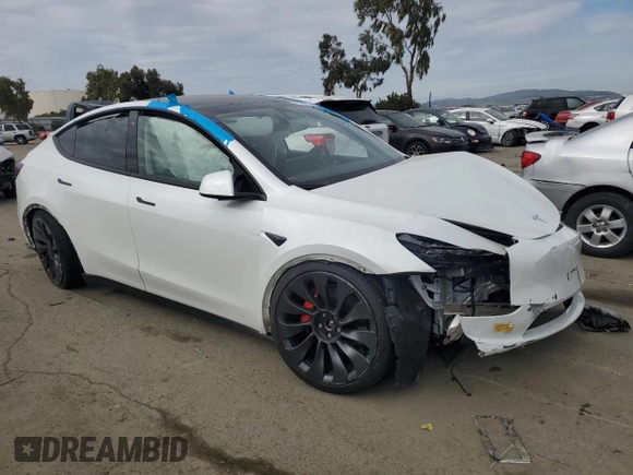2022 Tesla Model Y Performance with VIN 7SAYGDEF1NF410241, listed as a Copart auction lot 45017155 with 42,652 mi miles and Salvage Title. Bid and sale history available at DreamBid. Image 4.