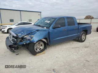 2005 Dodge Dakota ST with VIN 1D7HE28K65S250141, listed as a Copart auction lot 86490584 with 217,766 mi miles and Salvage Title. Bid and sale history available at carsss.com. Image 1.
