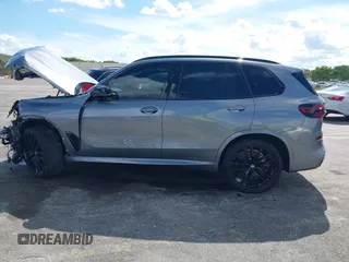 2025 BMW X5 M60i with VIN 5UX33EU03S9X62019, listed as a IAAI auction lot 41623189 with 5,749 mi miles. Bid and sale history available at carsss.com. Image 14.