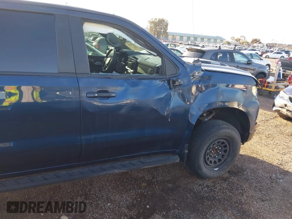 2023 Chevrolet Silverado 1500 LT Trail Boss with VIN 3GCUDFE8XPG152588, listed as a IAAI auction lot 41824795 with 21,903 mi miles and . Bid and sale history available at DreamBid. Image 6.
