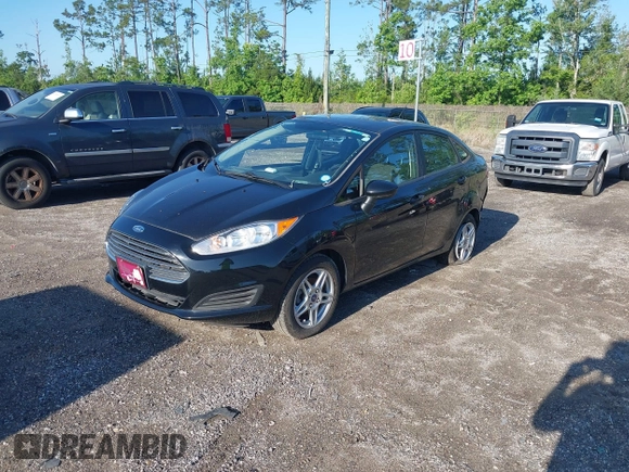 2019 Ford Fiesta SE z VIN 3FADP4BJ2KM159022, wystawiony jako IAAI lot #42269813 z przebiegiem 55 107 mil mil oraz . Historia ofert i sprzedaży dostępna na DreamBid. Obrazek 17.
