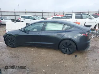 2025 Tesla Model 3 Long Range with VIN 5YJ3E1EA5SF911256, listed as a IAAI auction lot 41509976 with 1,806 mi miles. Bid and sale history available at carsss.com. Image 13.