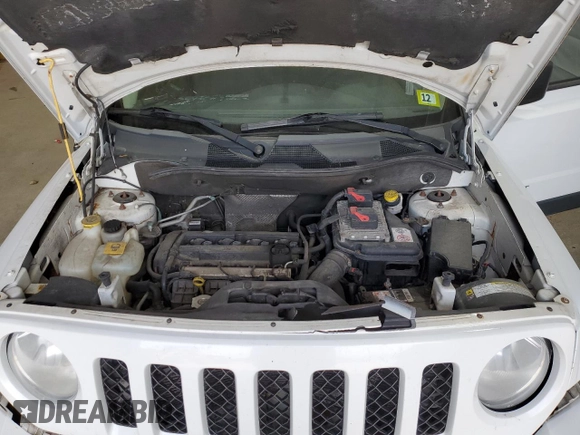 2011 Jeep Patriot Sport with VIN 1J4NT1GA4BD263521, listed as a Copart auction lot 54666735 with 176,606 mi miles and Salvage title. Bid and sale history available at DreamBid. Image 11.