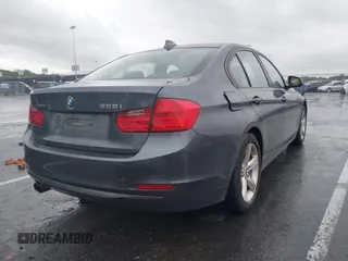 2014 BMW 3 Series 328i xDrive z VIN WBA3B5G51ENS09342, wystawiony jako IAAI lot #42270723 z przebiegiem 169 064 mil mil oraz . Historia ofert i sprzedaży dostępna na DreamBid. Obrazek 4.