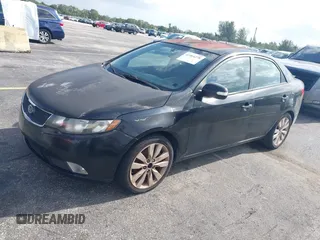 2010 Kia Forte SX with VIN KNAFW4A31A5310586, listed as a IAAI auction lot 41964278 with 1 mi miles. Bid and sale history available at carsss.com. Image 2.