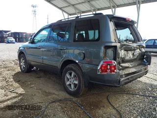 2007 Honda Pilot EX-L with VIN 5FNYF18777B012649, listed as a IAAI auction lot 42070873 with 167,419 mi miles and . Bid and sale history available at DreamBid. Image 3.