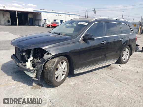 2016 Mercedes-Benz GL with VIN 4JGDF6EE3GA695470, listed as a Copart auction lot 74611604 with 127,417 mi miles and Salvage Title. Bid and sale history available at carsss.com. Image 1.