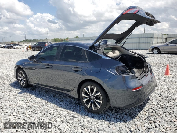 2023 Honda Civic EX-L z VIN 19XFL1H72PE010913, wystawiony jako Copart lot #51608005 z przebiegiem 35 961 mil mil oraz Szkoda całkowita • Salvage title. Historia ofert i sprzedaży dostępna na DreamBid. Obrazek 2.