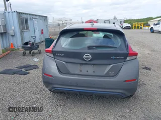 2020 Nissan LEAF SV Plus z VIN 1N4BZ1CP6LC304083, wystawiony jako IAAI lot #42135309 z przebiegiem 80 804 mil mil oraz . Historia ofert i sprzedaży dostępna na DreamBid. Obrazek 16.