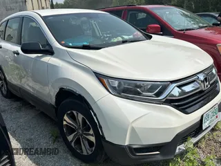 2017 Honda CR-V LX z VIN 2HKRW6H39HH207184, wystawiony jako Copart lot #60989075 z przebiegiem 102 677 mil mil oraz Czysty tytuł • Clean title. Historia ofert i sprzedaży dostępna na DreamBid. Obrazek 1.
