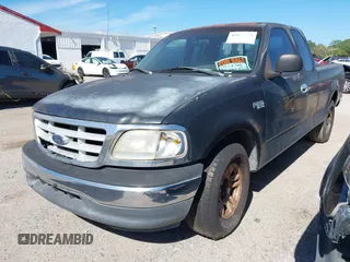 1999 Ford F-150 z VIN 1FTZX1725XKA26611, wystawiony jako IAAI lot #42037812 z przebiegiem Nie podano mil oraz . Historia ofert i sprzedaży dostępna na DreamBid. Obrazek 2.