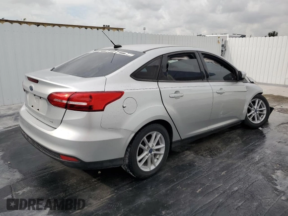 2018 Ford Focus SE z VIN 1FADP3F29JL272804, wystawiony jako Copart lot #49612625 z przebiegiem Nie podano mil oraz Czysty tytuł • Clean title. Historia ofert i sprzedaży dostępna na DreamBid. Obrazek 3.