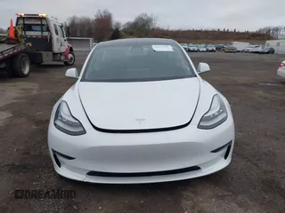 2020 Tesla Model 3 Standard Range Plus with VIN 5YJ3E1EA7LF659172, listed as a IAAI auction lot 42017026 with 32,104 mi miles. Bid and sale history available at carsss.com. Image 12.