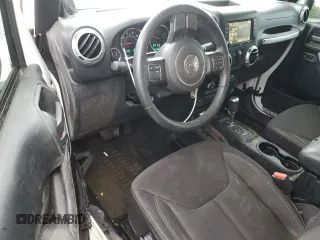 2013 Jeep Wrangler Sahara with VIN 1C4AJWBGXDL579341, listed as a Copart auction lot 55970815 with 105,961 mi miles and Salvage title. Bid and sale history available at DreamBid. Image 8.