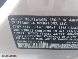 2013 Volkswagen Passat SE w/Sunroof & Nav with VIN 1VWBH7A33DC145554, listed as a IAAI auction lot 41808150 with 142,051 mi miles. Bid and sale history available at carsss.com. Image 9.