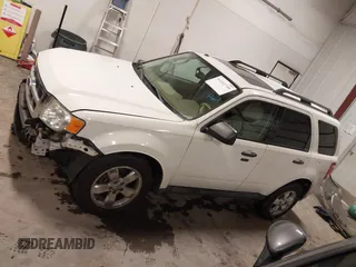 2012 Ford Escape XLT z VIN 1FMCU9DG4CKA72675, wystawiony jako IAAI lot #41212739 z przebiegiem 112 781 mil mil oraz . Historia ofert i sprzedaży dostępna na DreamBid. Obrazek 15.