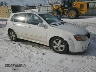 2007 Kia Spectra with VIN KNAFE162475006498, listed as a Copart auction lot 42902375 with 122,865 mi miles and Salvage Title. Bid and sale history available at carsss.com. Image 4.