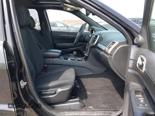 2014 Jeep Grand Cherokee Laredo with VIN 1C4RJFAG1EC315544, listed as a IAAI auction lot 42105987 with 164,430 mi miles. Bid and sale history available at carsss.com. Image 5.