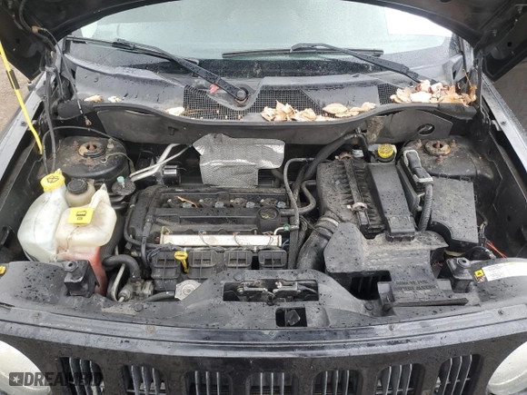 2010 Jeep Patriot Sport with VIN 1J4NT2GA0AD506486, listed as a Copart auction lot 86419334 with 61,111 mi miles and Salvage Title. Bid and sale history available at carsss.com. Image 12.