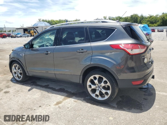 2015 Ford Escape Titanium z VIN 1FMCU0J98FUB06577, wystawiony jako Copart lot #61341175 z przebiegiem 66 206 mil mil oraz Szkoda całkowita • Salvage title. Historia ofert i sprzedaży dostępna na DreamBid. Obrazek 2.