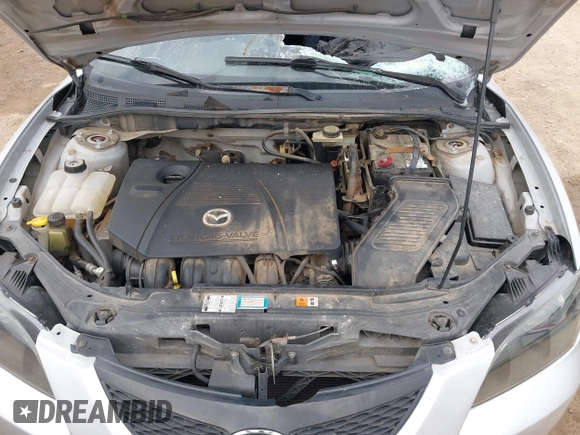 2004 Mazda 3 i with VIN JM1BK12F041158011, listed as a IAAI auction lot 41676950 with Not Provided miles and . Bid and sale history available at DreamBid. Image 10.
