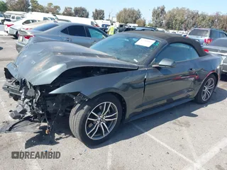 2016 Ford Mustang EcoBoost Premium z VIN 1FATP8UH7G5279277, wystawiony jako IAAI lot #42309882 z przebiegiem 111 519 mil mil oraz . Historia ofert i sprzedaży dostępna na DreamBid. Obrazek 2.