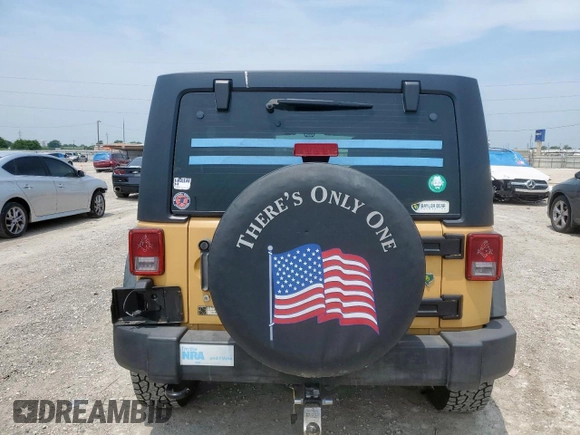 2013 Jeep Wrangler Unlimited Sport z VIN 1C4BJWDG7DL650142, wystawiony jako Copart lot #56846935 z przebiegiem 69 371 mil mil oraz Szkoda całkowita • Salvage title. Historia ofert i sprzedaży dostępna na DreamBid. Obrazek 6.