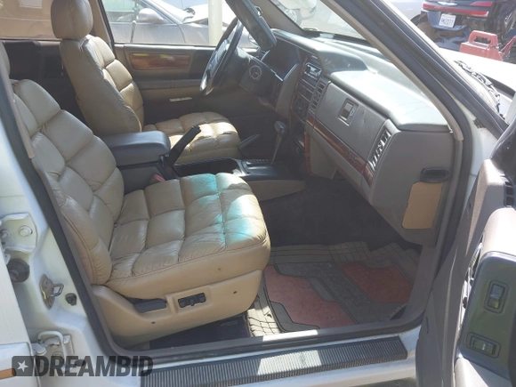 1994 Jeep Grand Cherokee Limited with VIN 1J4GZ78Y2RC344121, listed as a IAAI auction lot 42489350 with 219,186 mi miles and . Bid and sale history available at DreamBid. Image 5.