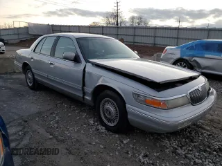 1996 Mercury Grand Marquis GS with VIN 2MELM74W8TX653415, listed as a Copart auction lot 85582734 with 187,282 mi miles and Salvage Title. Bid and sale history available at DreamBid. Image 4.