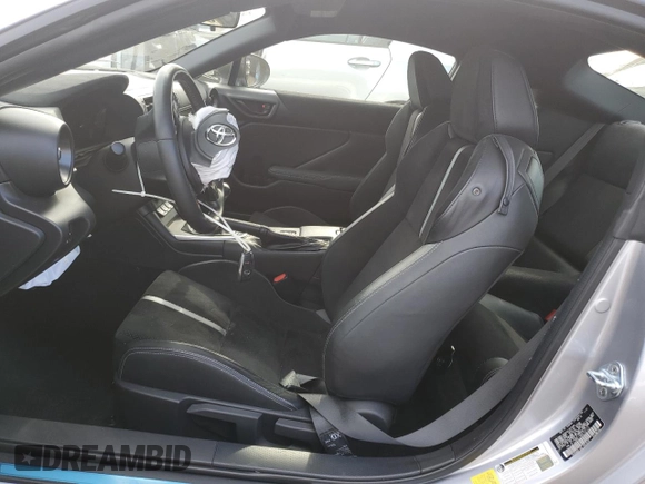 2022 Toyota GR86 Premium with VIN JF1ZNBE19N9750723, listed as a Copart auction lot 83248234 with 21,607 mi miles and Salvage Title. Bid and sale history available at carsss.com. Image 7.