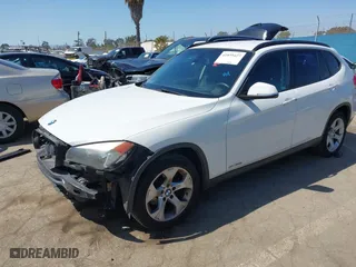 2014 BMW X1 sDrive28i with VIN WBAVM1C5XEVW53725, listed as a IAAI auction lot 41859427 with 181,892 mi miles. Bid and sale history available at carsss.com. Image 18.