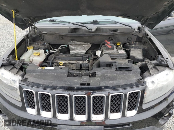 2016 Jeep Compass Sport z VIN 1C4NJCBA6GD705687, wystawiony jako Copart lot #60283815 z przebiegiem 166 920 mil mil oraz Szkoda całkowita • Salvage title. Historia ofert i sprzedaży dostępna na DreamBid. Obrazek 11.