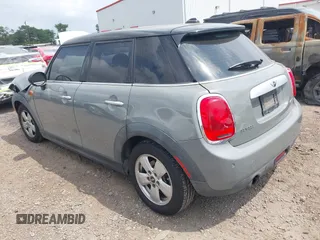 2015 MINI Hardtop 4 Door with VIN WMWXS5C56FT830418, listed as a IAAI auction lot 42132285 with 111,428 mi miles and . Bid and sale history available at DreamBid. Image 3.