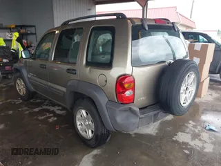 2003 Jeep Liberty Sport with VIN 1J4GK48K13W633818, listed as a IAAI auction lot 41962552 with 217,884 mi miles and . Bid and sale history available at DreamBid. Image 3.