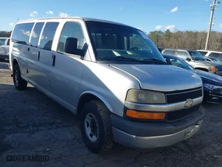 2013 Chevrolet Express Passenger 1LT with VIN 1GAZG1FA6D1103764, listed as a IAAI auction lot 41173886 with 470,000 mi miles. Bid and sale history available at carsss.com. Image 1.