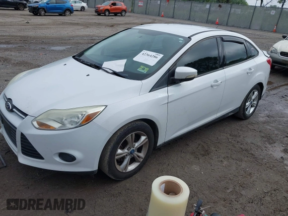 2013 Ford Focus SE z VIN 1FADP3F29DL372289, wystawiony jako IAAI lot #42364286 z przebiegiem 201 091 mil mil oraz . Historia ofert i sprzedaży dostępna na DreamBid. Obrazek 2.