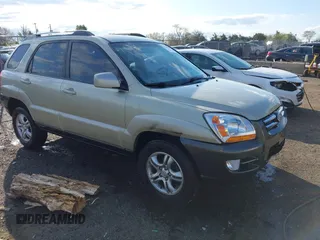 2005 Kia Sportage LX z VIN KNDJF723757042084, wystawiony jako IAAI lot #42034418 z przebiegiem 83 120 mil mil oraz . Historia ofert i sprzedaży dostępna na DreamBid. Obrazek 1.