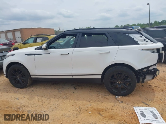 2020 Land Rover Range Rover Velar S z VIN SALYB2EX3LA292863, wystawiony jako IAAI lot #42077381 z przebiegiem 41 595 mil mil oraz . Historia ofert i sprzedaży dostępna na DreamBid. Obrazek 13.