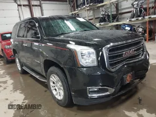 2017 GMC Yukon SLT with VIN 1GKS2BKC0HR147128, listed as a IAAI auction lot 41226119 with 147,557 mi miles. Bid and sale history available at carsss.com. Image 1.