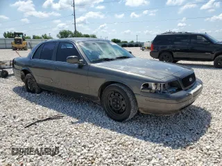 2007 Ford Police Interceptor with VIN 2FAFP71W27X152722, listed as a Copart auction lot 56252475 with 105,657 mi miles and Salvage title. Bid and sale history available at DreamBid. Image 4.