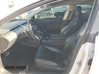 2020 Tesla Model 3 Standard Range Plus z VIN 5YJ3E1EAXLF644911, wystawiony jako Copart lot #52390785 z przebiegiem 138 783 mil mil oraz Szkoda całkowita • Salvage title. Historia ofert i sprzedaży dostępna na DreamBid. Obrazek 7.