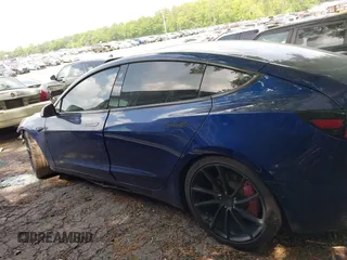 2018 Tesla Model 3 Long Range Battery with VIN 5YJ3E1EA2JF040914, listed as a IAAI auction lot 42120091 with 138,130 mi miles and . Bid and sale history available at DreamBid. Image 13.