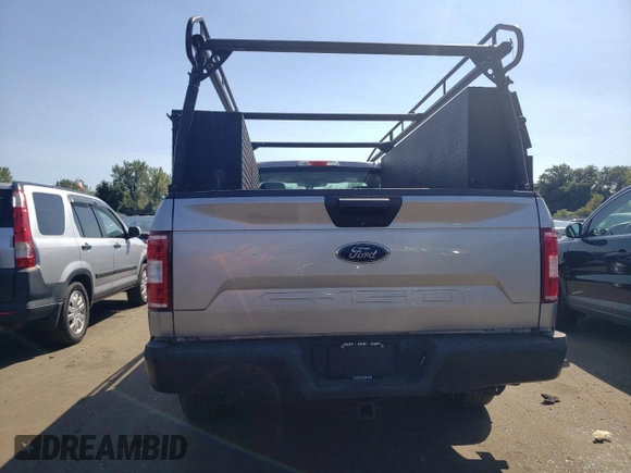 2020 Ford F-150 XL with VIN 1FTMF1C50LKE01683, listed as a Copart auction lot 70235144 with 57,325 mi miles and Salvage Title. Bid and sale history available at carsss.com. Image 6.